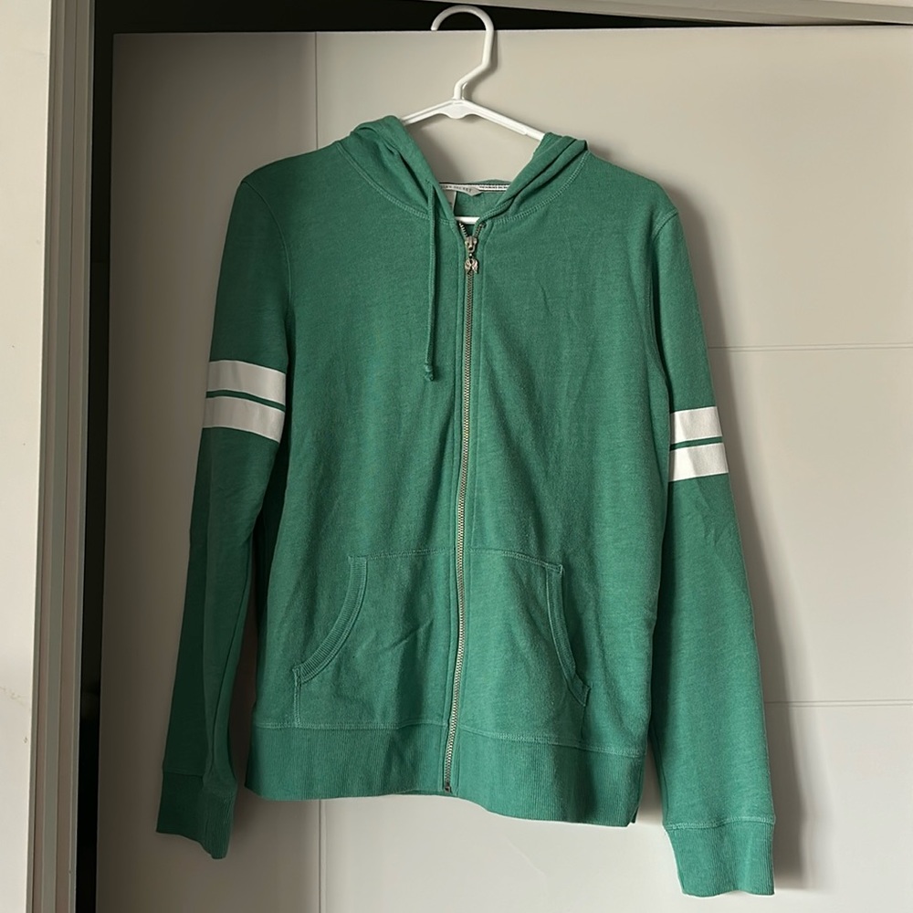 Small, green Victoria’s Secret sweatshirt